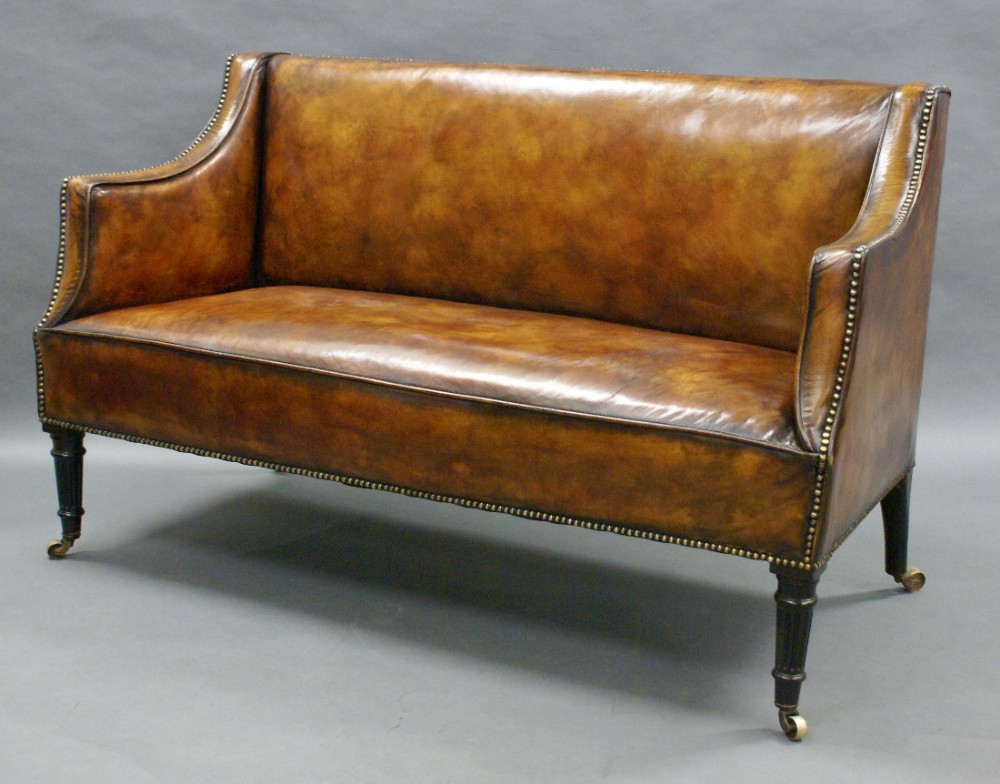 A 19th century leather 2 seat sofa