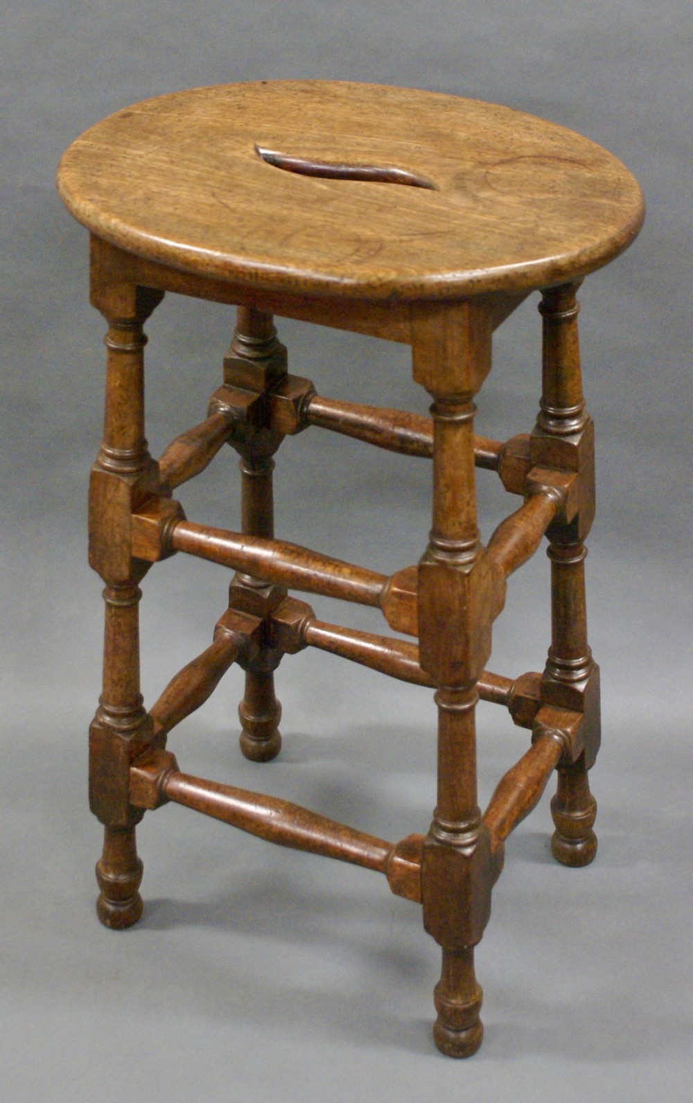 A very unusual George III Mahogany stool