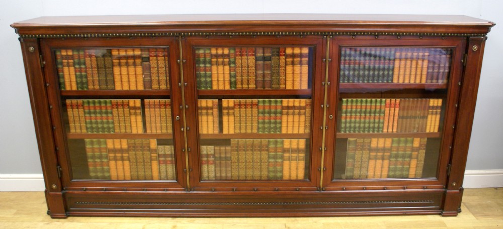 A large glazed low bookcase 
