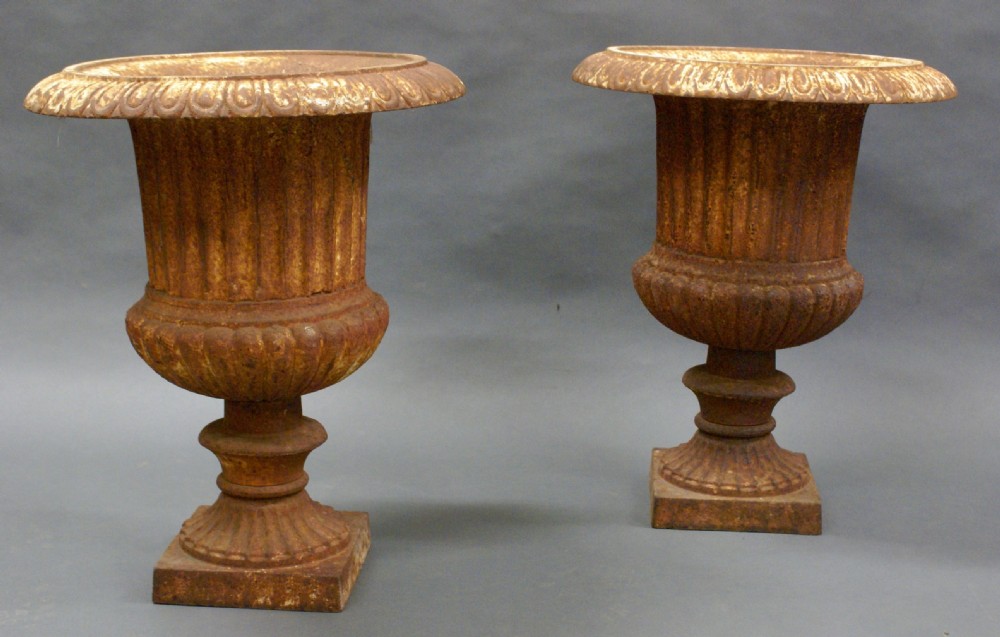 A pair of cast iron garden urns View IV
