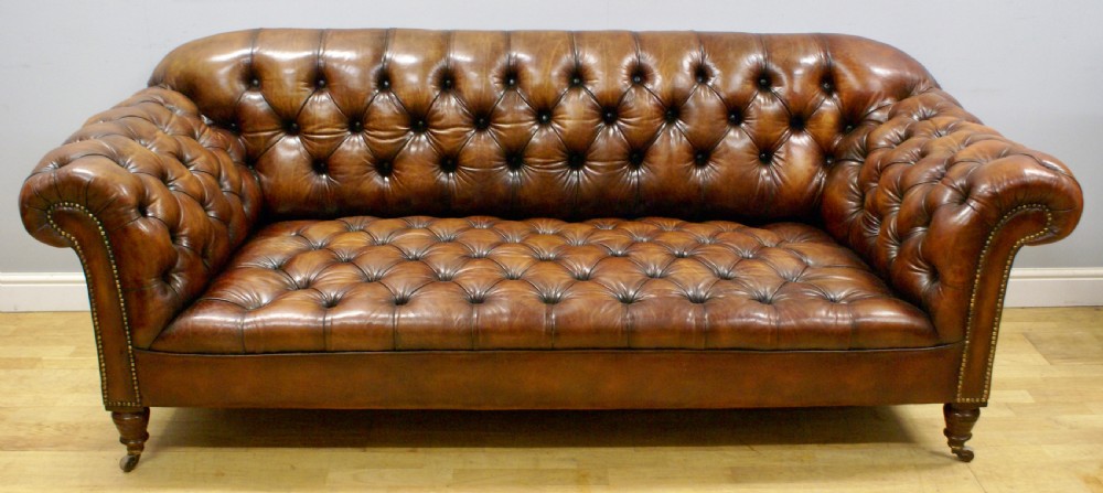 A Victorian buttoned leather chesterfield View III