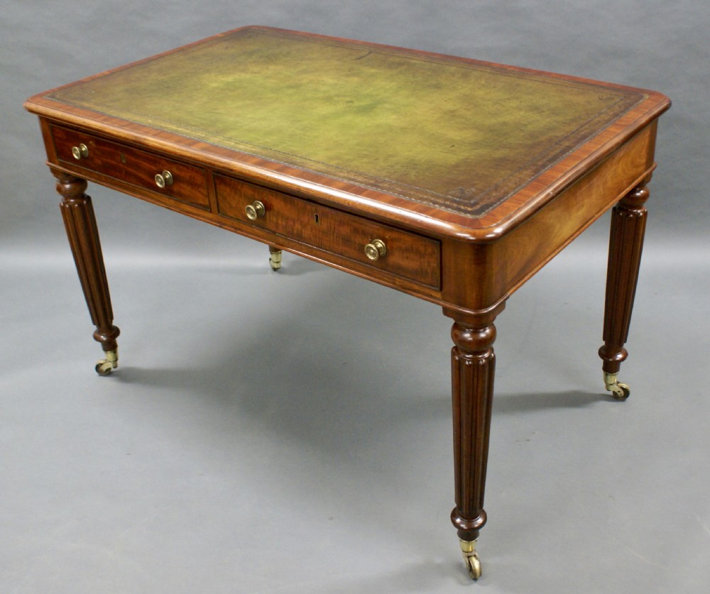 A fine quality mahogany writing table View II