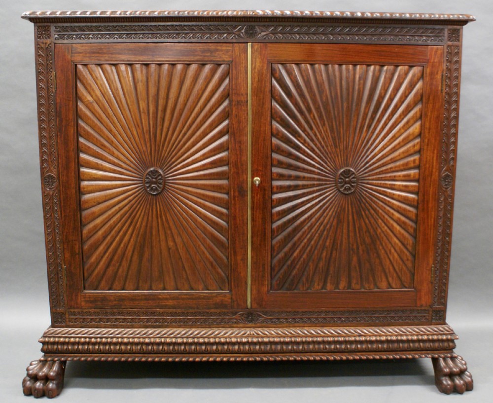 An Anglo Indian carved cabinet