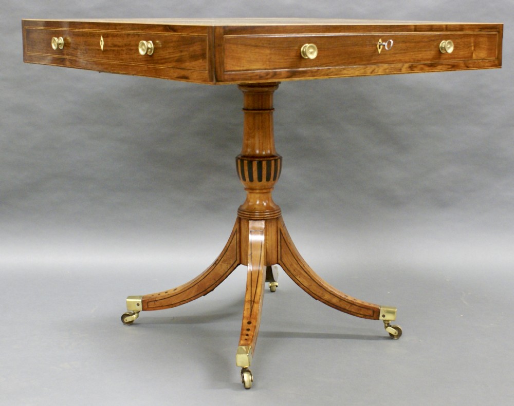 A George III rosewood and satinwood games table View II