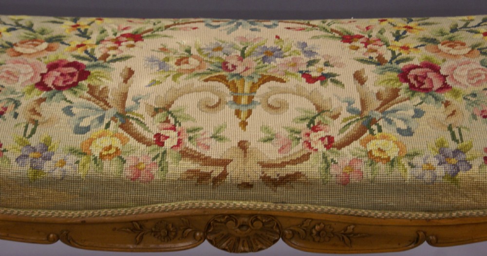 A Victorian stool with tapestry upholstery View V