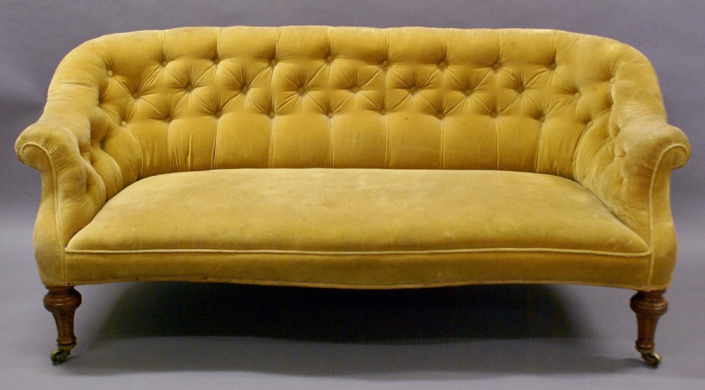 A walnut sofa possibly by Holland and Son View II