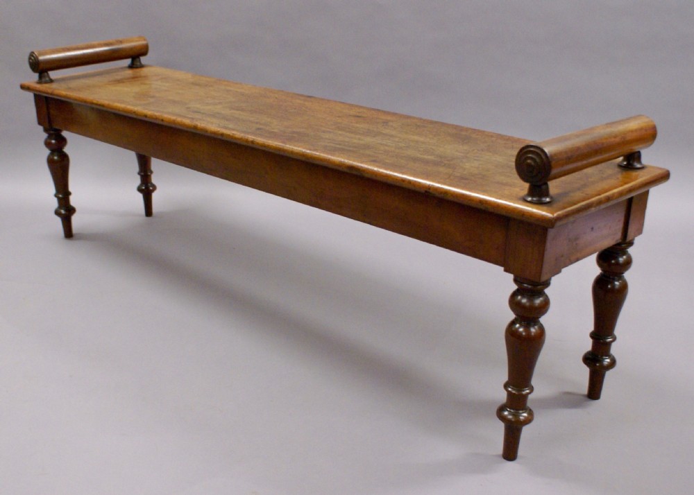 A very large mahogany hall bench View V