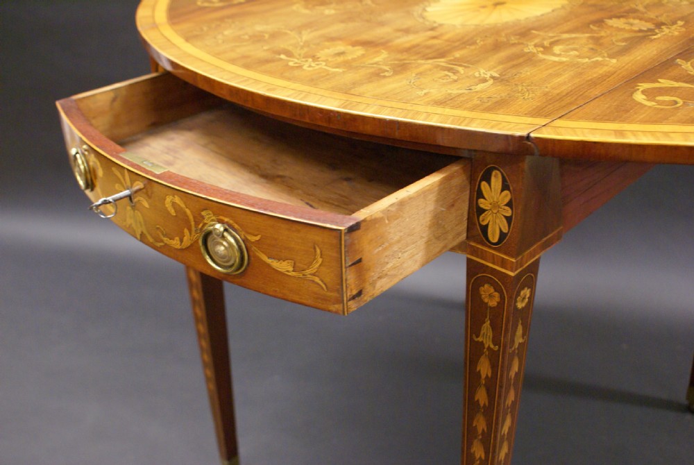 A Sheraton period inlaid oval Pembroke table View VIII