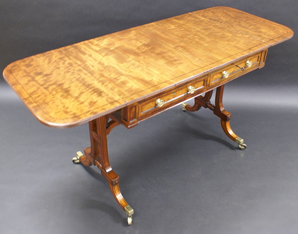 A fine Regency mahogany sofa table View III