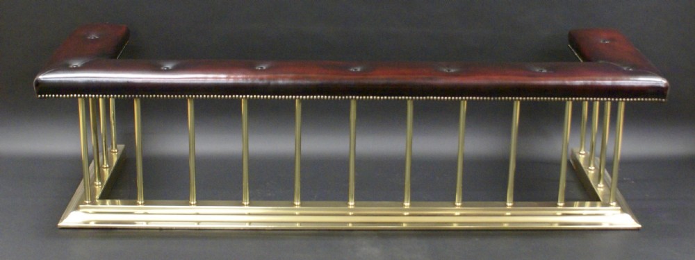 A very large Edwardian club fender