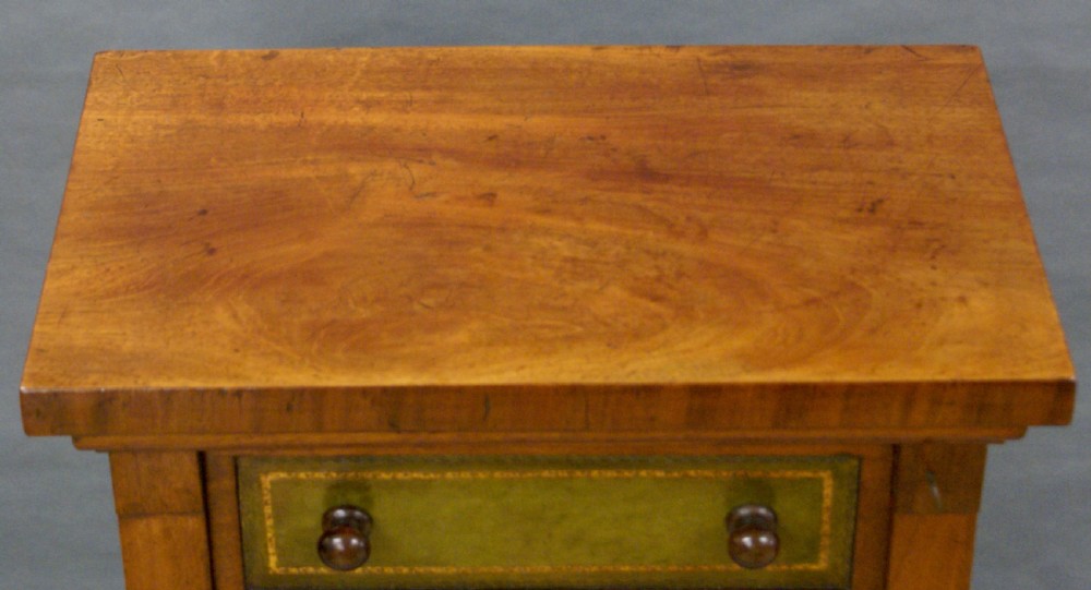 A Victorian mahogany wellington chest of drawers View V