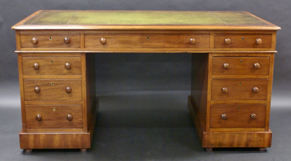 A Victorian mahogany pedestal desk View II