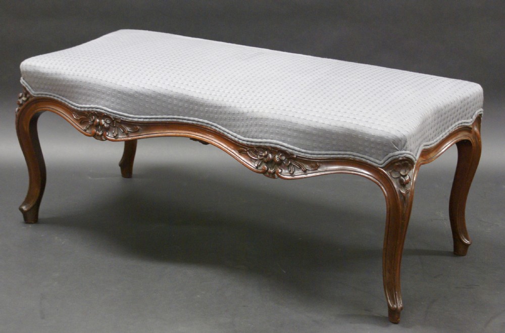 An unusual mahogany carved window seat View II