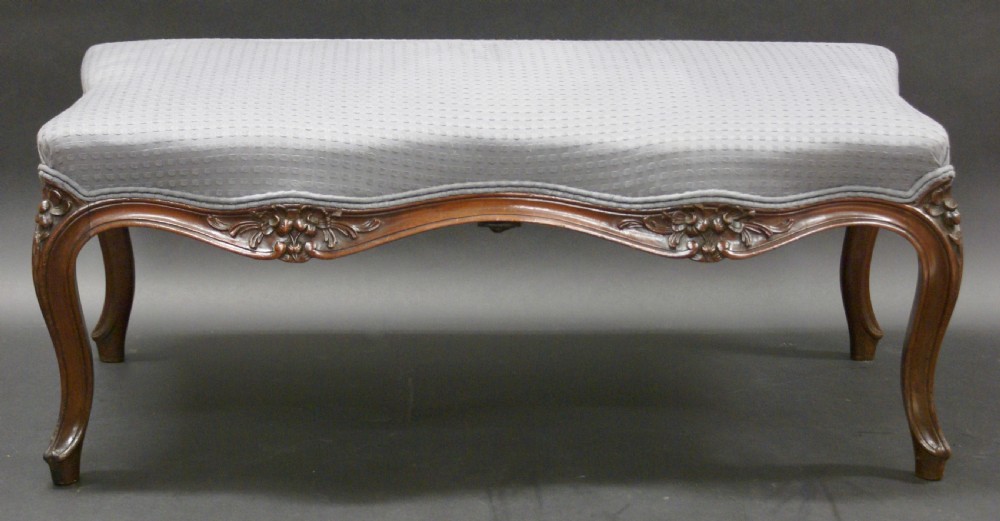 An unusual mahogany carved window seat View III