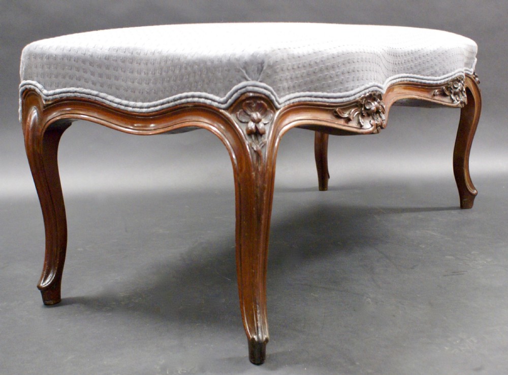 An unusual mahogany carved window seat View IV