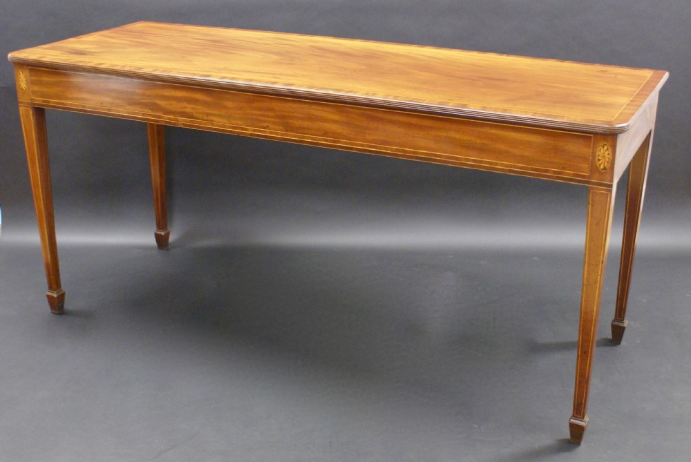 A fine George III mahogany serving table View II