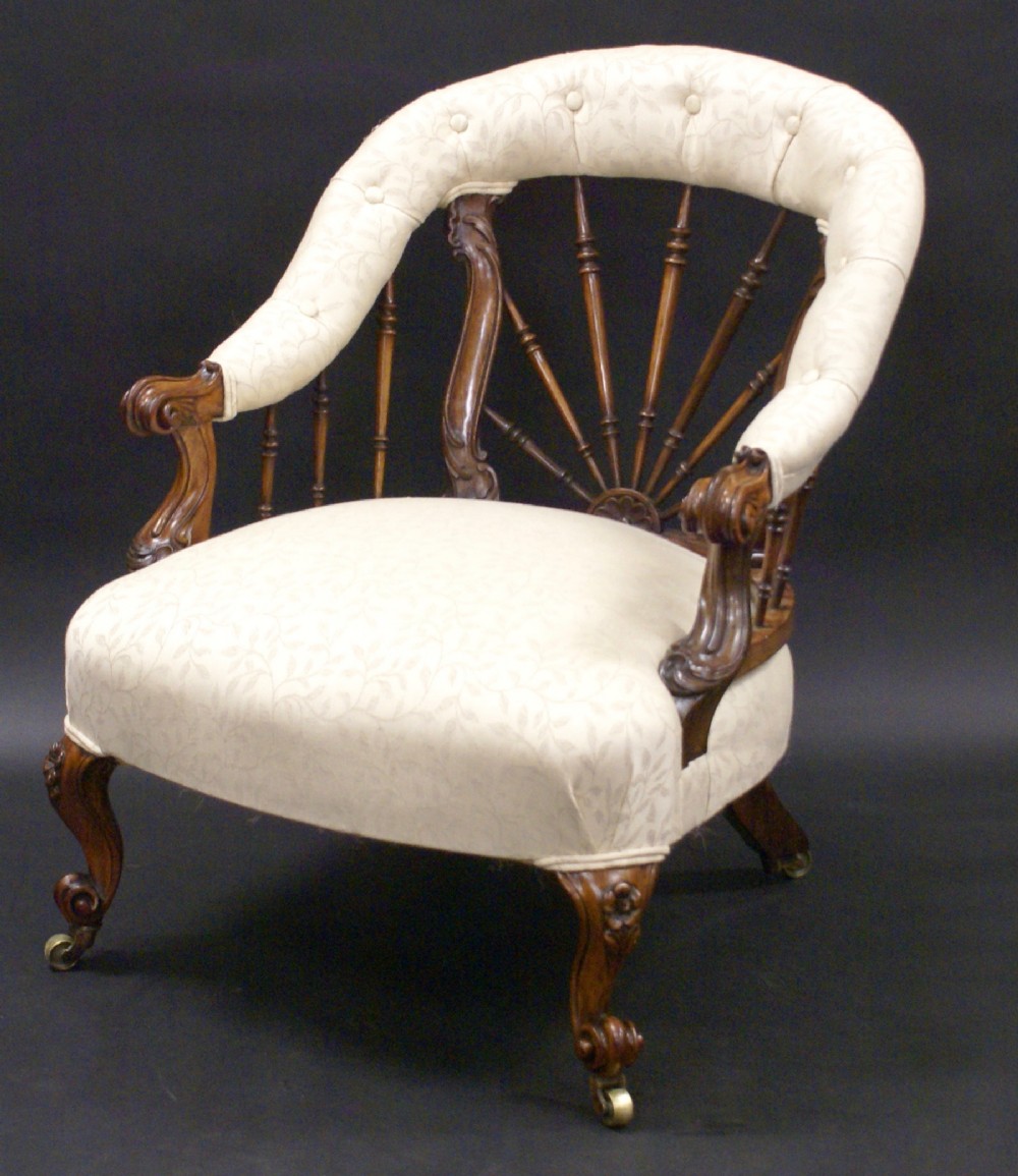 A Howard and Sons rosewood arm chair