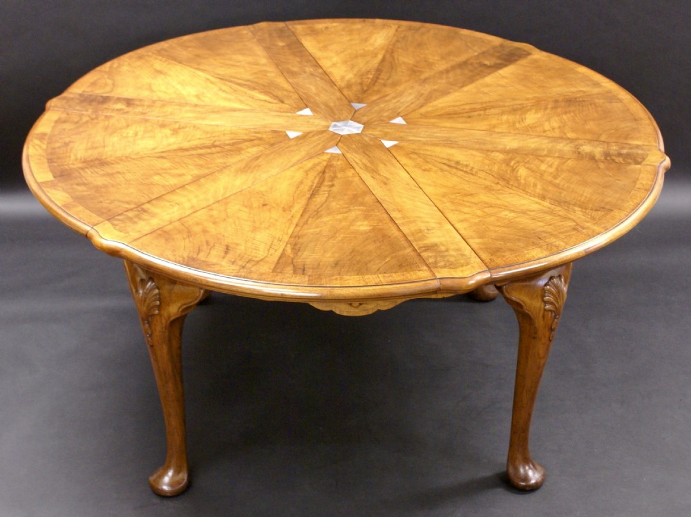 A superb Jupe style dining table by Gillows. View III