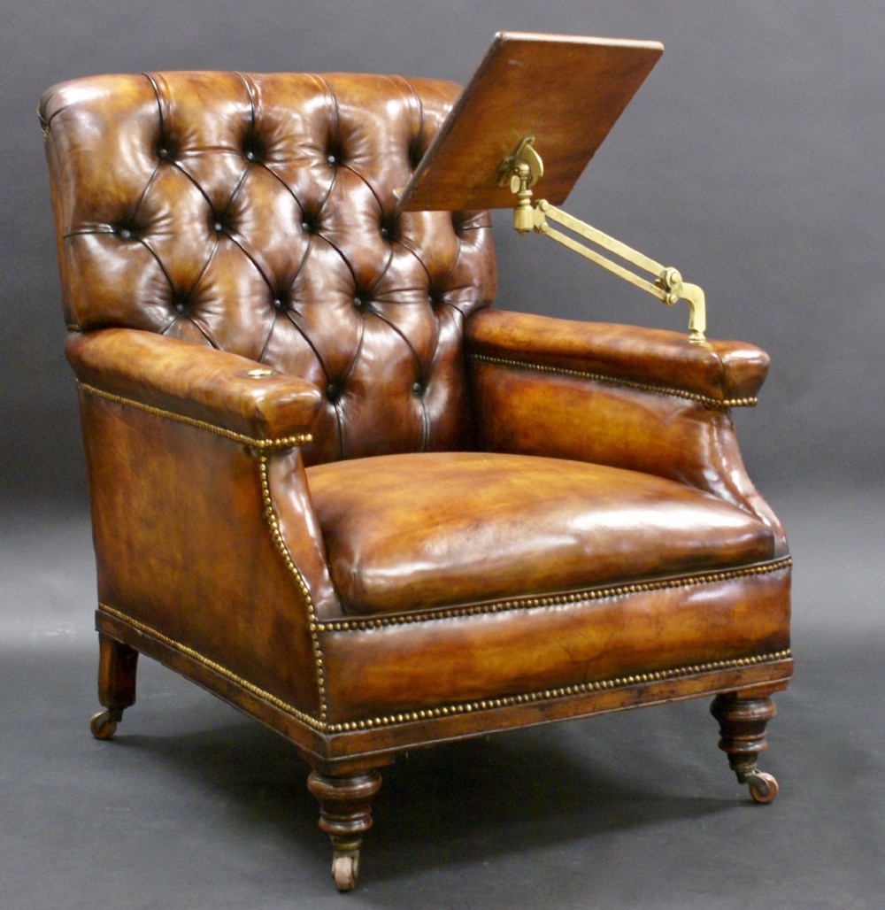 A Large Leather Upholstered Reading Chair 542157
