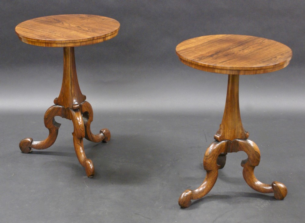 A pair of Victorian rosewood tripod tables View II