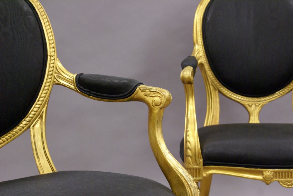 A pair of 18th century English gilt arm chairs View III
