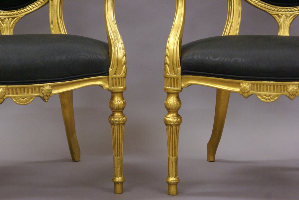 A pair of 18th century English gilt arm chairs View IV