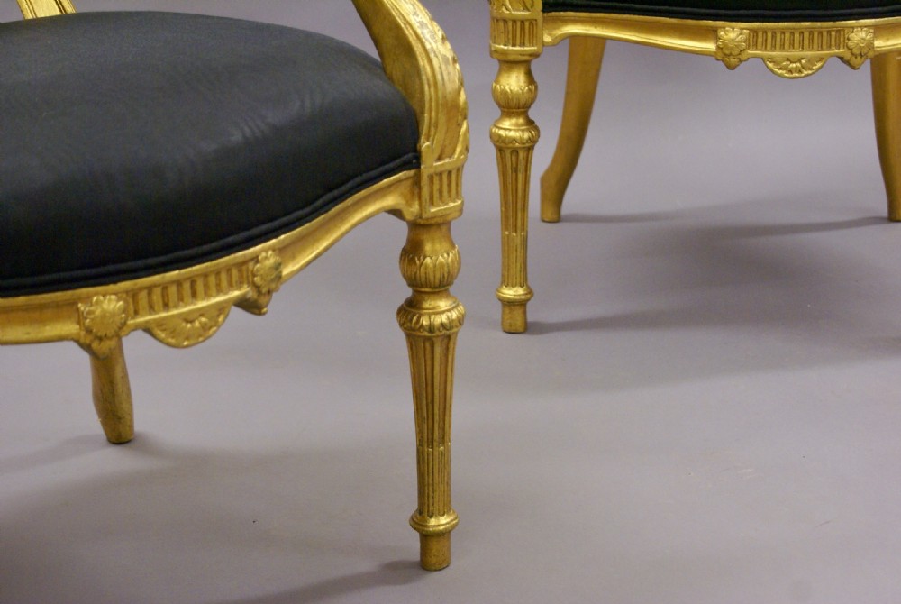 A pair of 18th century English gilt arm chairs View V