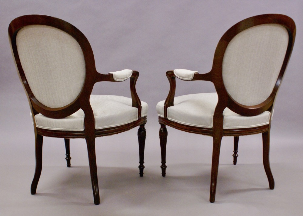 A fine pair of Hepplewhite Revival arm chairs View V