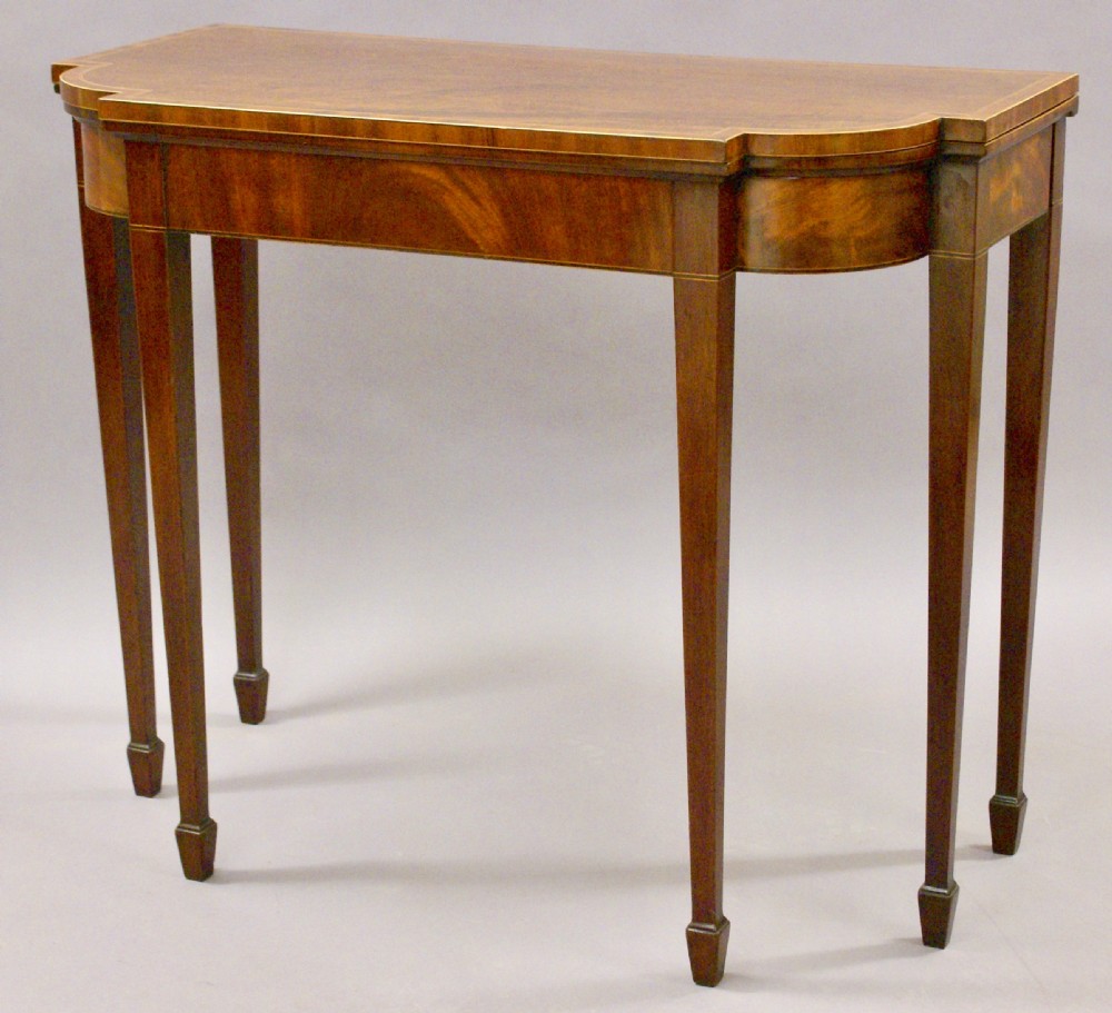 An unusual George III mahogany card table View II