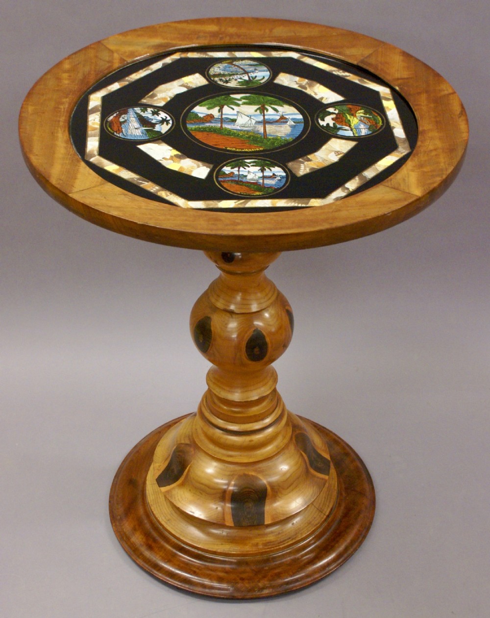 An unusual mahogany center table