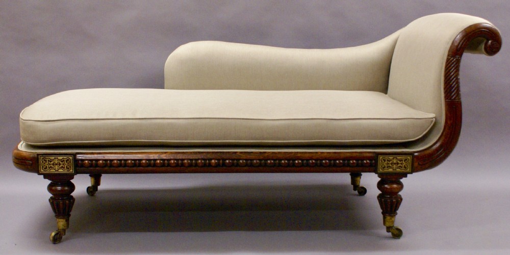 A Regency brass inlaid chaise lounge