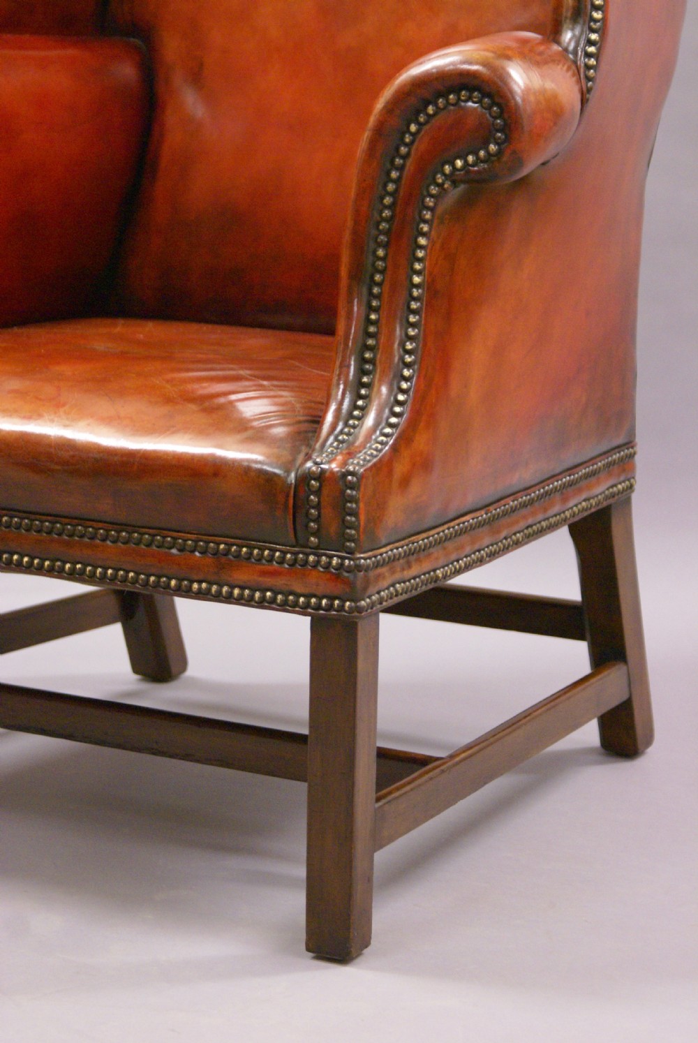 A very large George III style wing chair View III