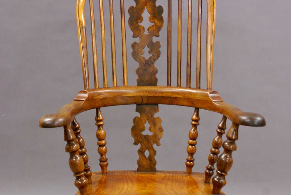 A 19th century Yew wood and elm rocking chair View V