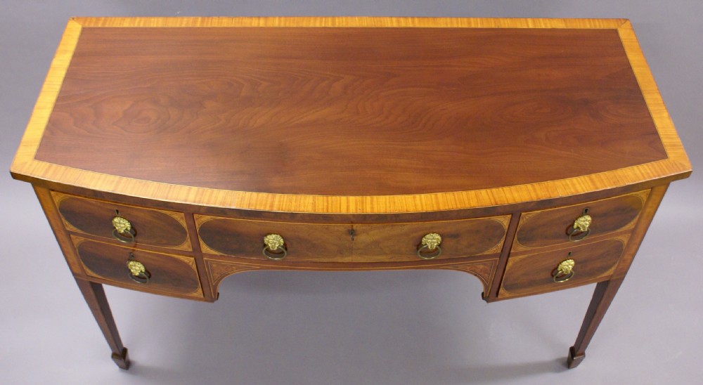A fine George III mahogany bow-fronted sideboard View VI