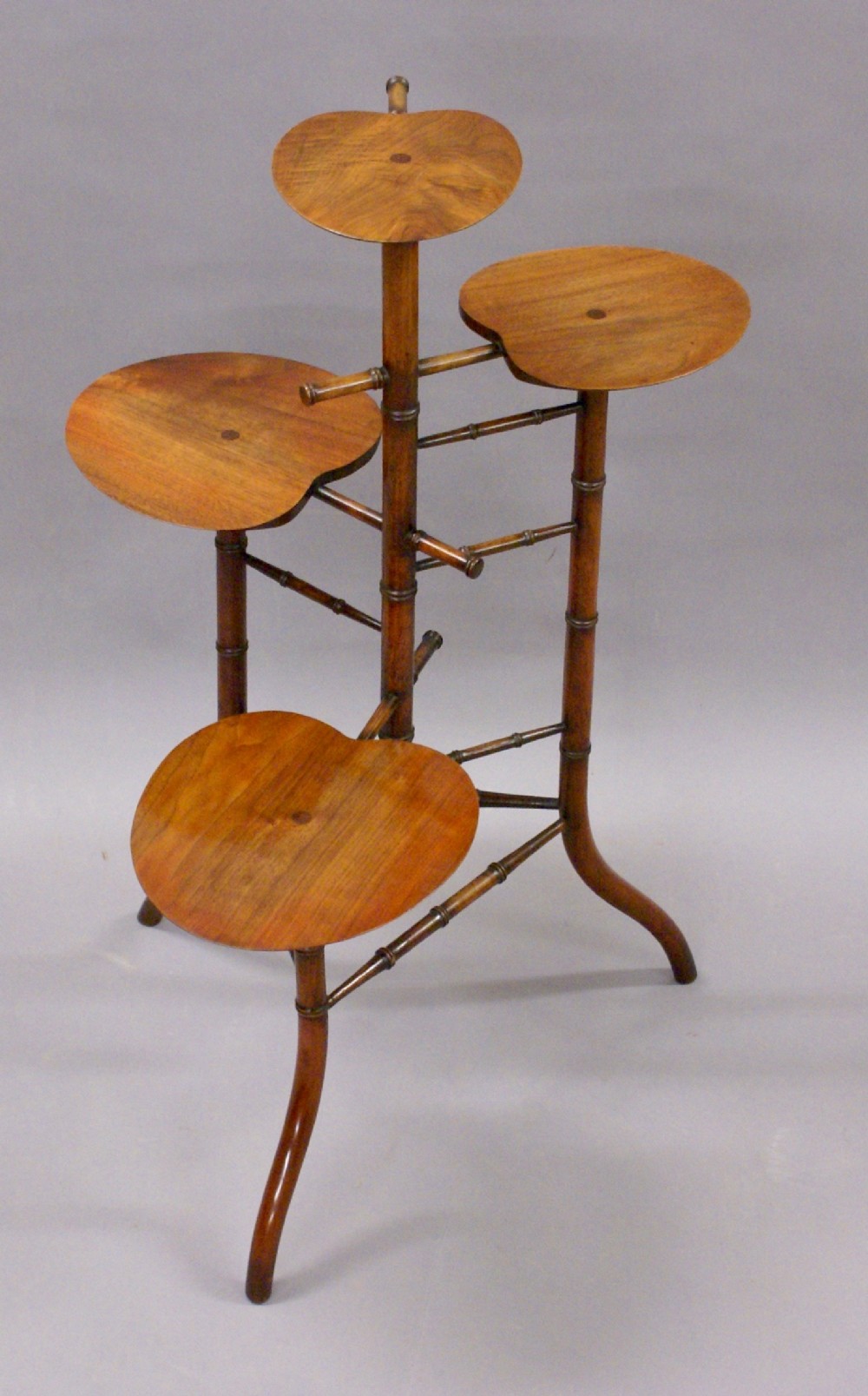 A stylish stand attributed to Liberty's of London