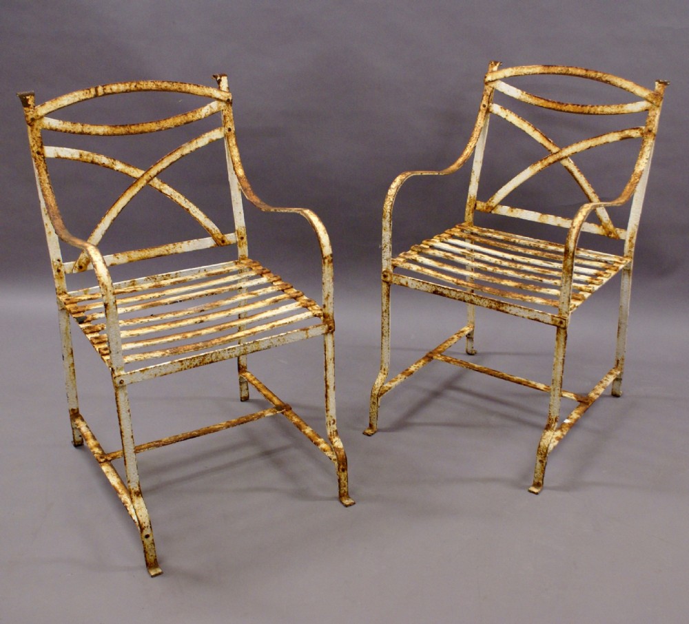 A pair of 19th century garden chairs