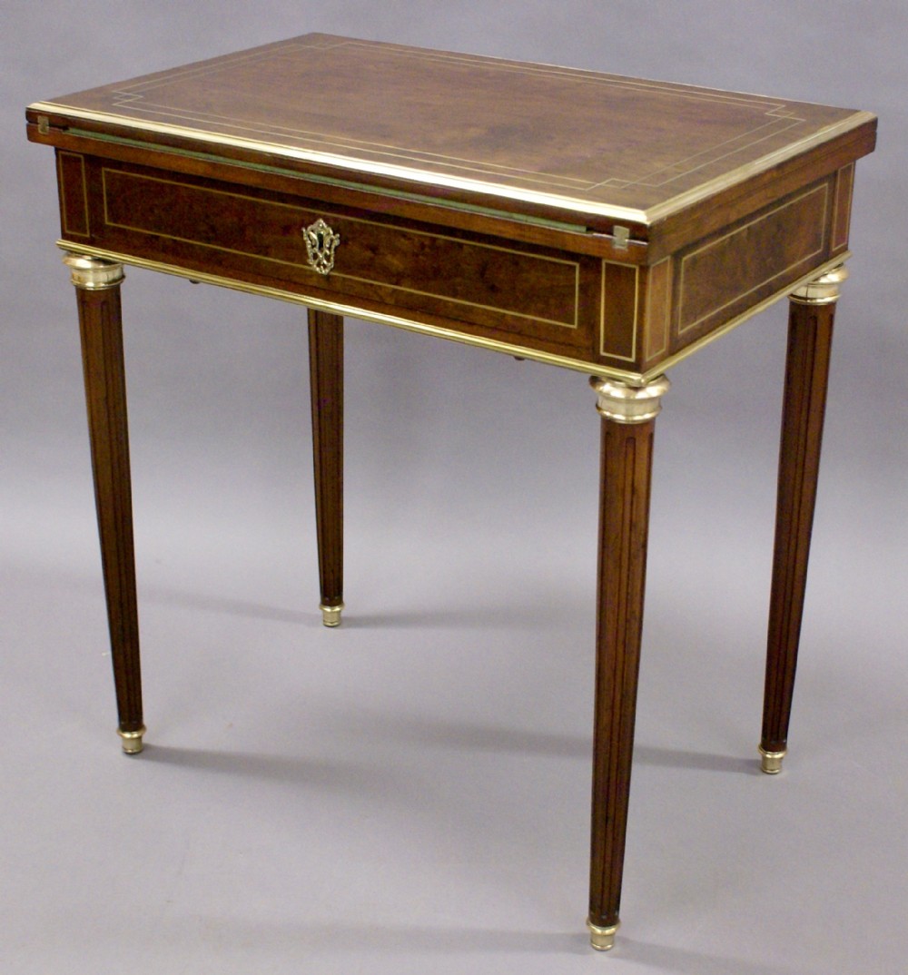 A Napoleon III brass inlaid card table