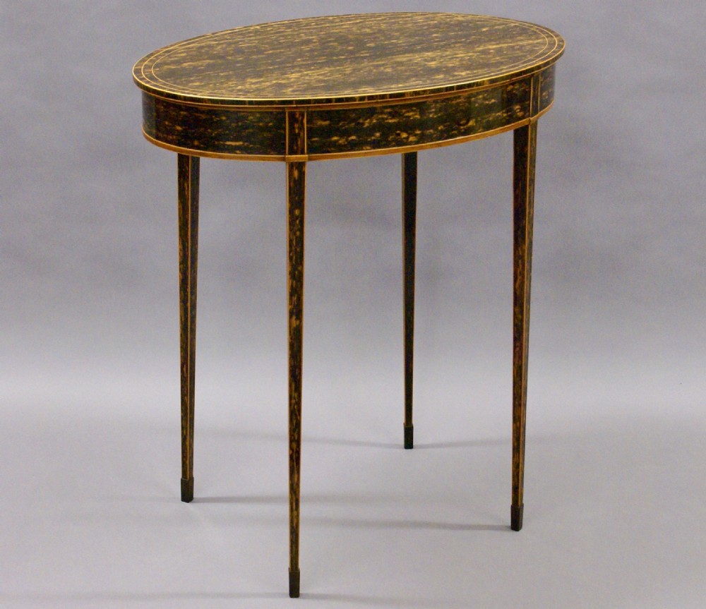 A fine table by Collinson & Lock