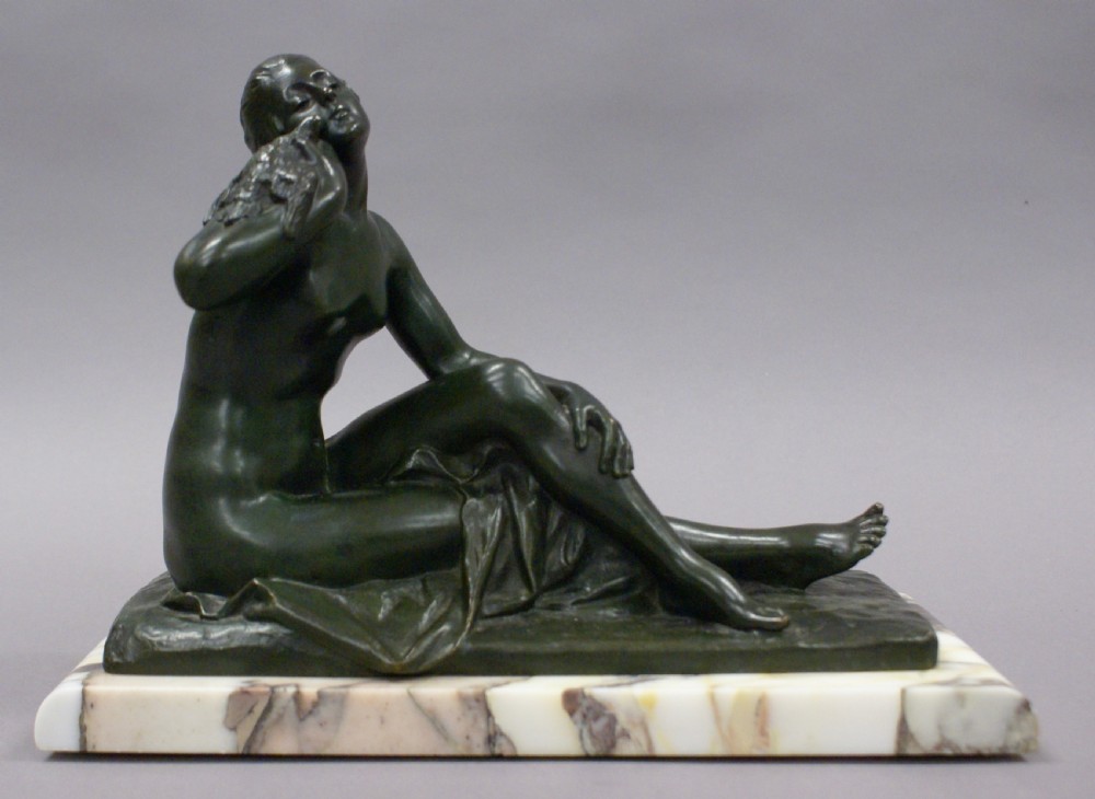 An Art Deco bronze figure holding a bird View II