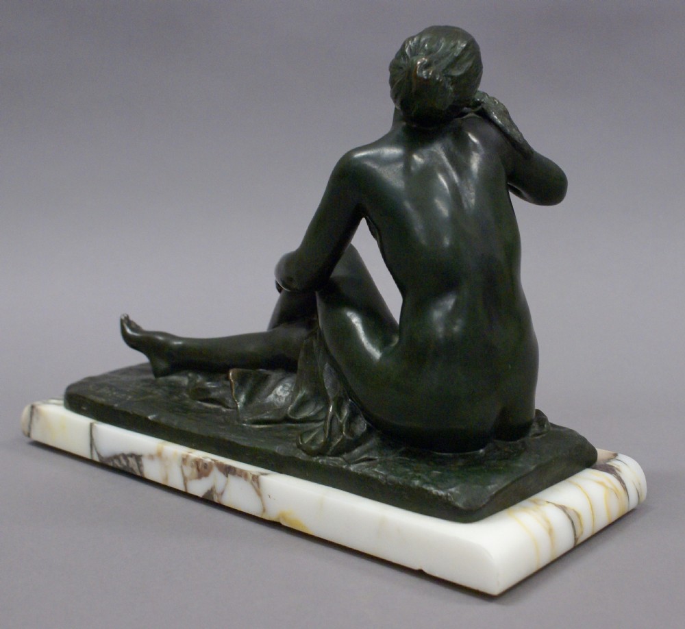 An Art Deco bronze figure holding a bird View III