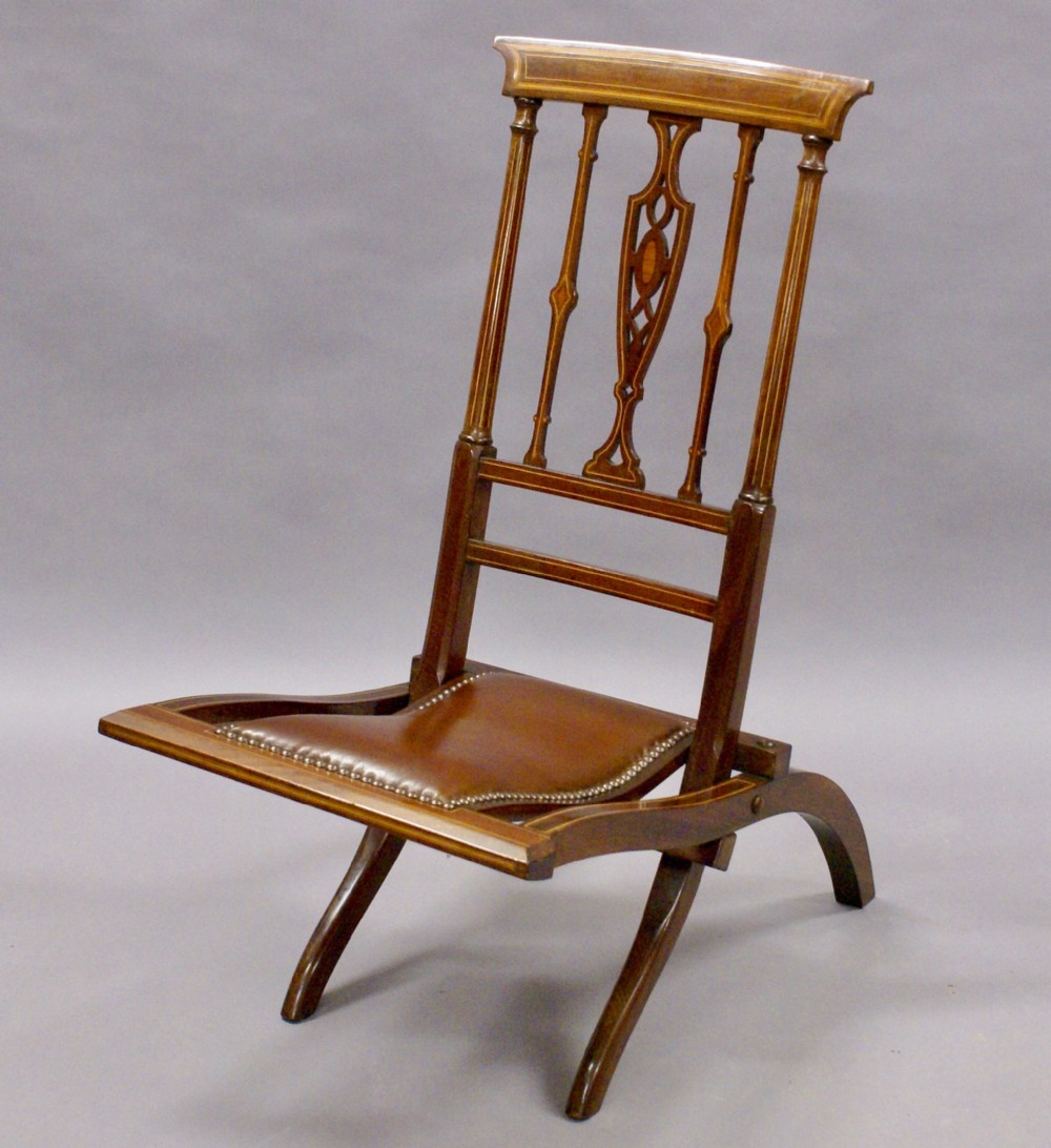 A late Victorian folding chair