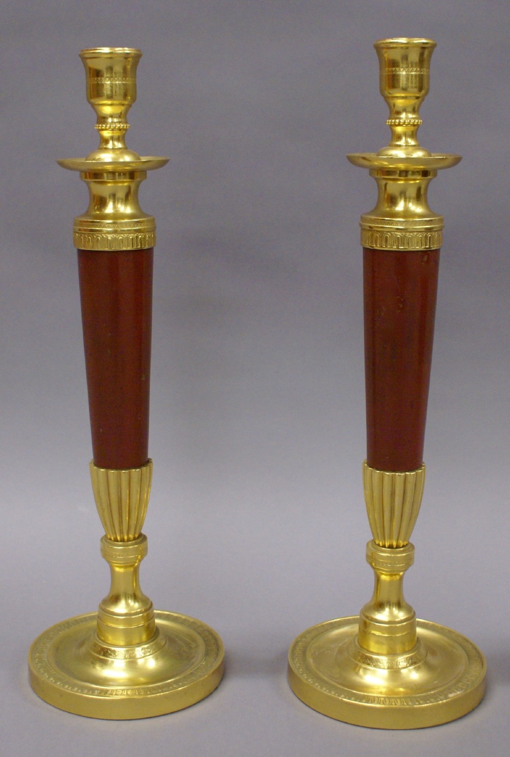A fine pair of ormolu candle sticks