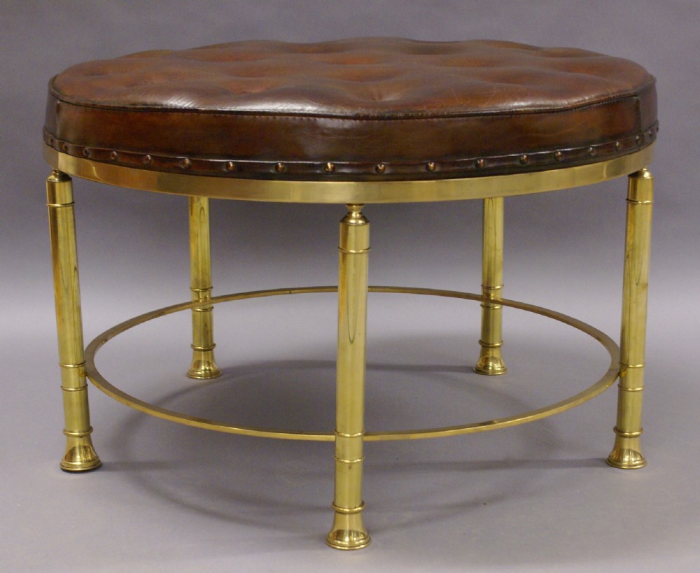 A large circular brass & leather stool View II