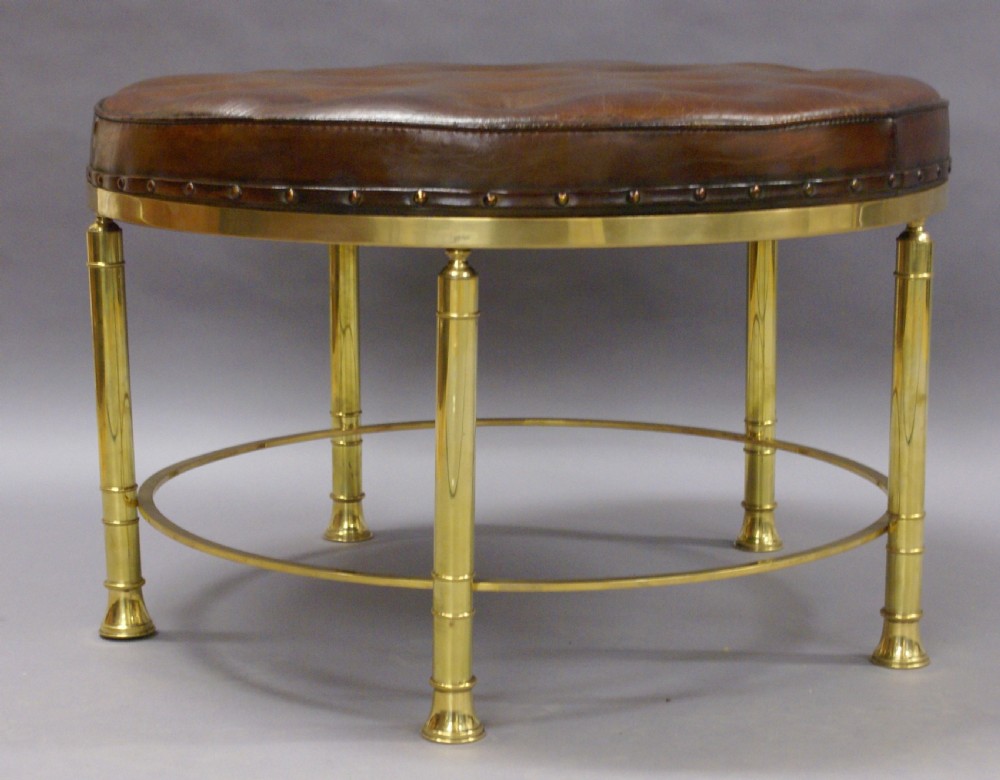 A large circular brass & leather stool View IV