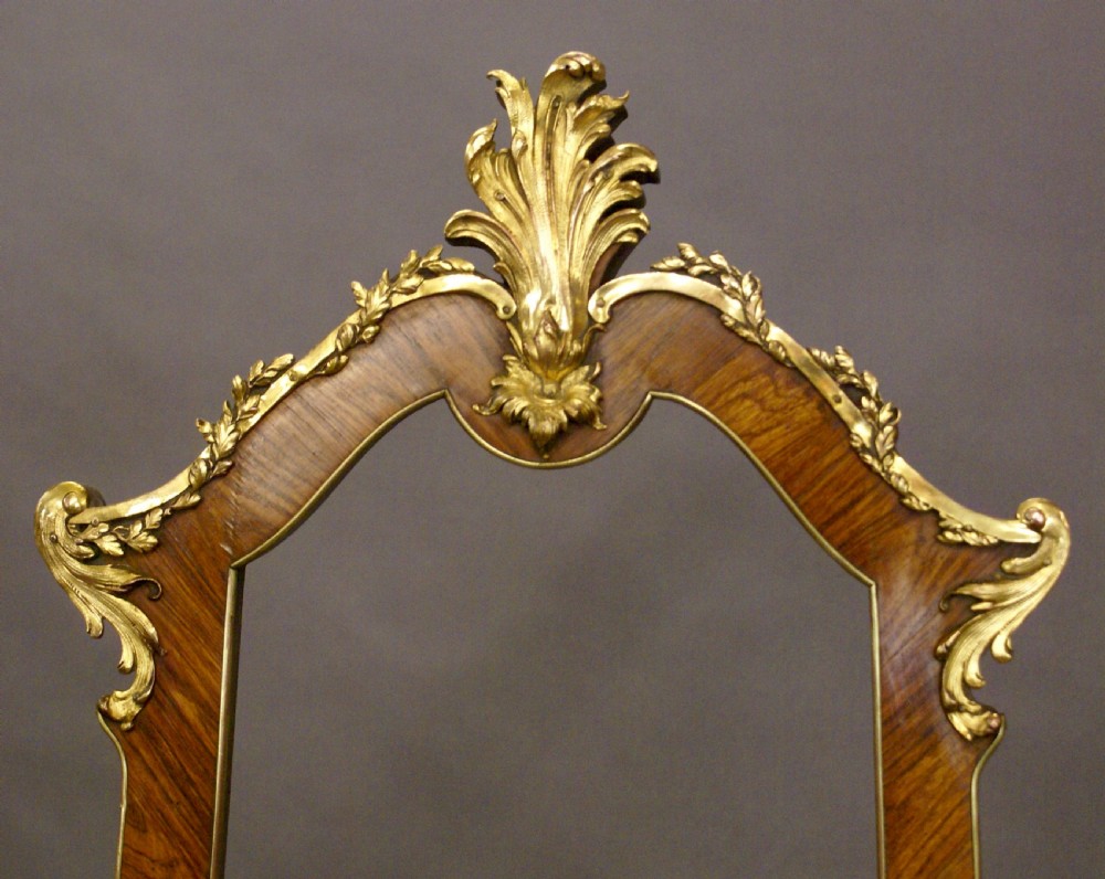 A superb kingwood and ormolu easel View V