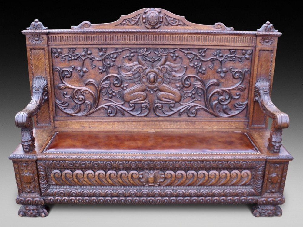 A very impressive carved oak hall bench View V