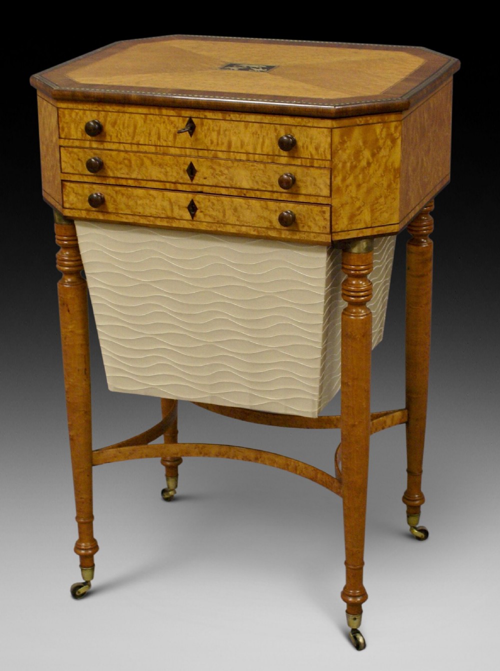 A very fine Birds-eye maple work table