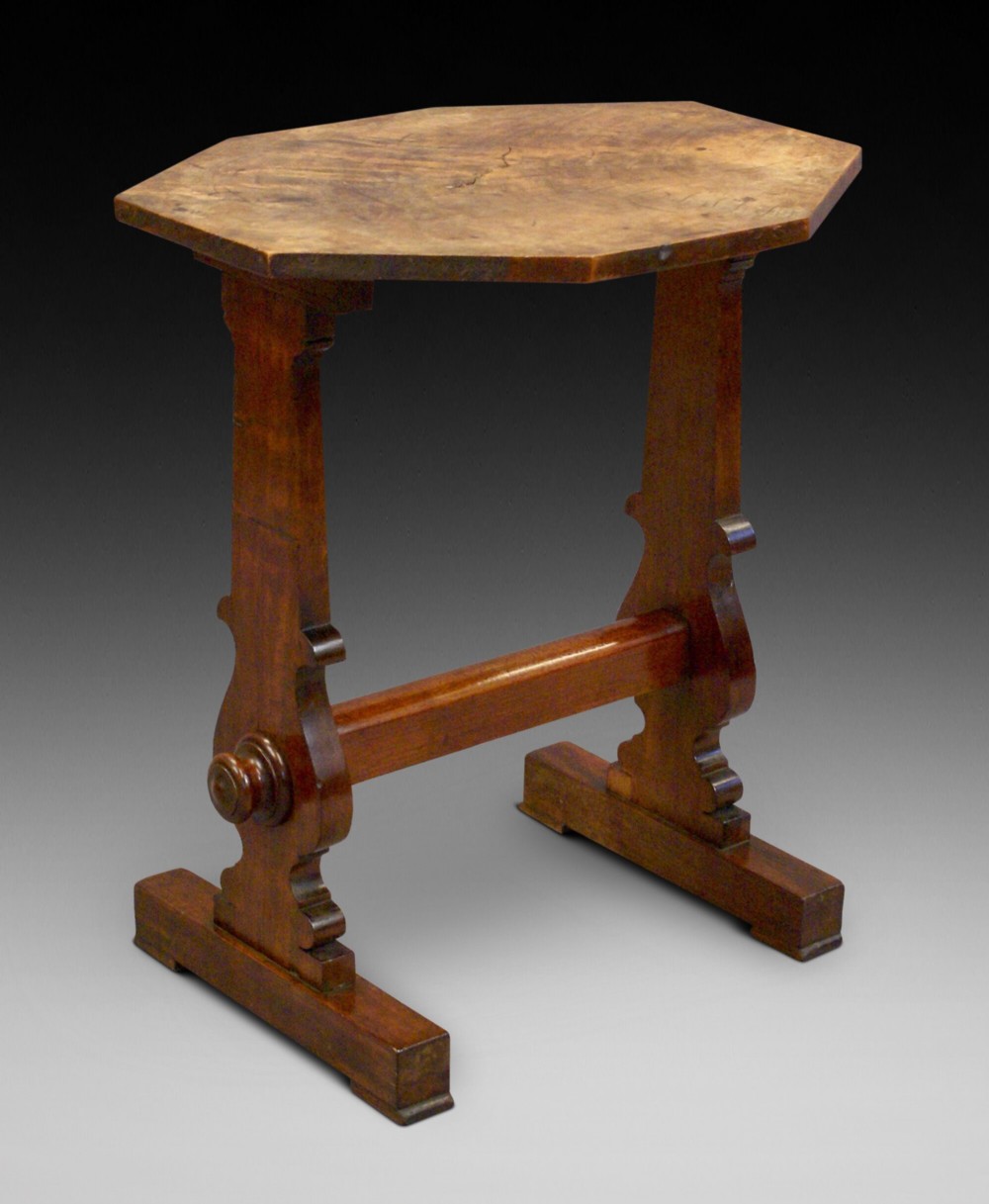 An unusual flame mahogany side table