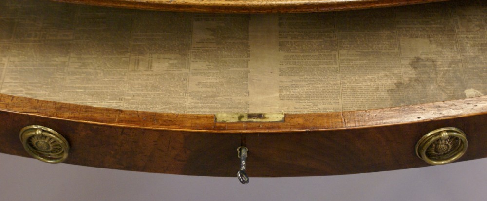 A George III bow-fronted side table View IV