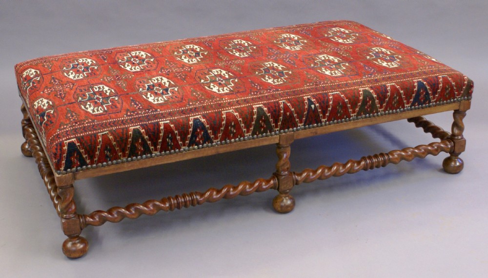 A very large walnut stool View II
